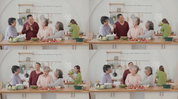 快乐的亚洲老年人在素食烹饪上的联系:厨房里的爱、笑声和团聚。