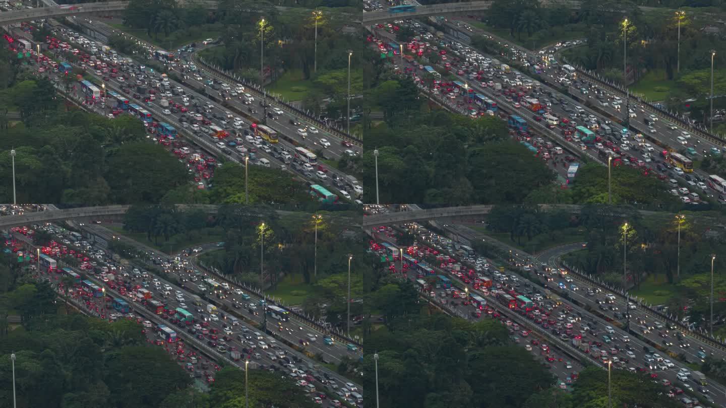 黄昏时间雅加达市高交通街道道路高峰时间航拍全景4k延时印尼