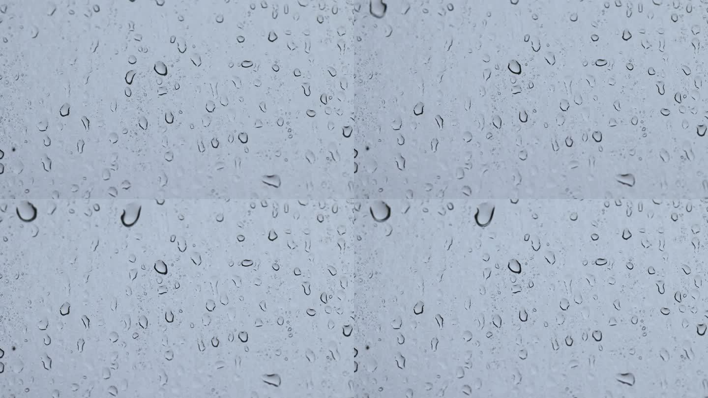 大雨刮风时窗玻璃上有雨滴