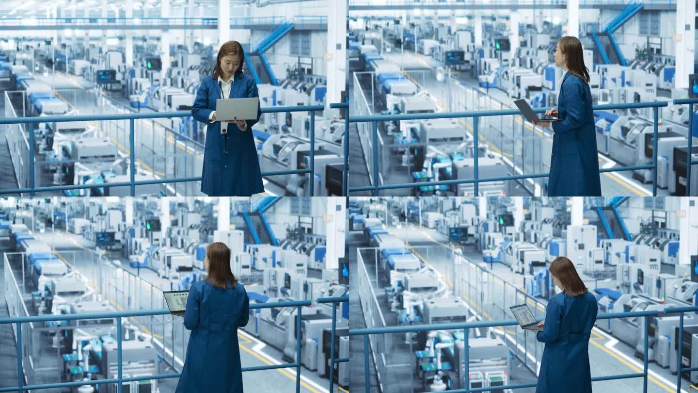 日本工厂专家在未来的工业制造中与自主人工智能机器人一起研究笔记本电脑。项目经理在计算机上监控数据，检
