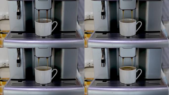自助咖啡机在酒店提供一致的优质咖啡，咖啡从玻璃杯中溢出。咖啡机把咖啡灌满了。一杯用咖啡机煮的咖啡，因