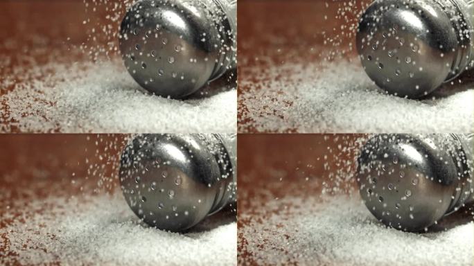 盐落在盐瓶上。用高速摄像机拍摄，每秒1000帧。