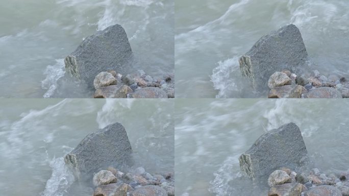 高山河泛滥河水汹涌冲击石头视频素材