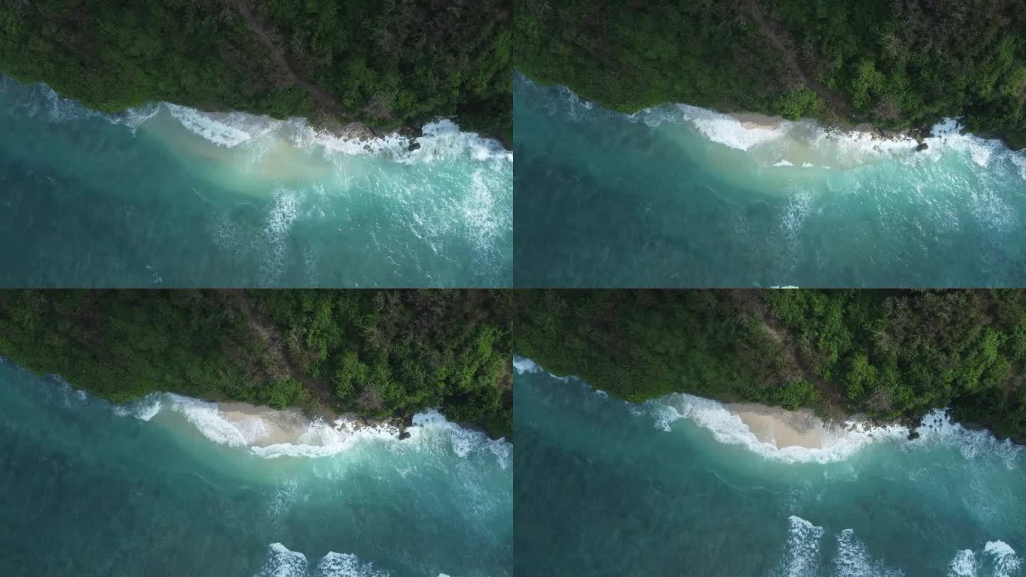 空中4K无人机镜头:发现巴厘岛最好的秘密，绿碗海滩;宁静的热带天堂，有神秘的洞穴、金色的沙滩和绿松石