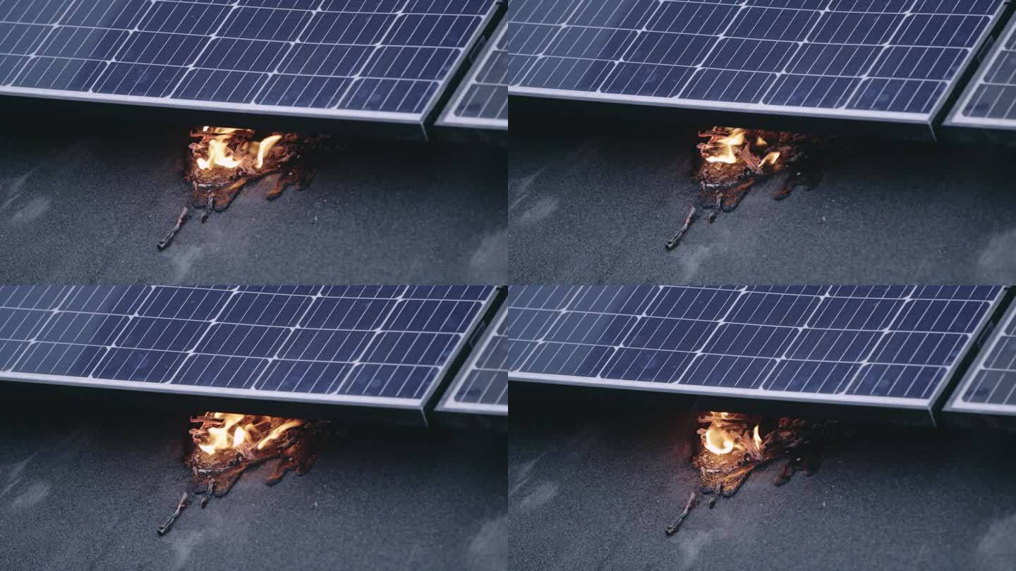 防火太阳能板在受控环境下着火的耐久性测试。点燃电池，融化塑料表面
