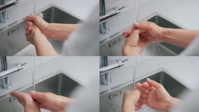 女人在厨房洗手清洁水流饮水安全