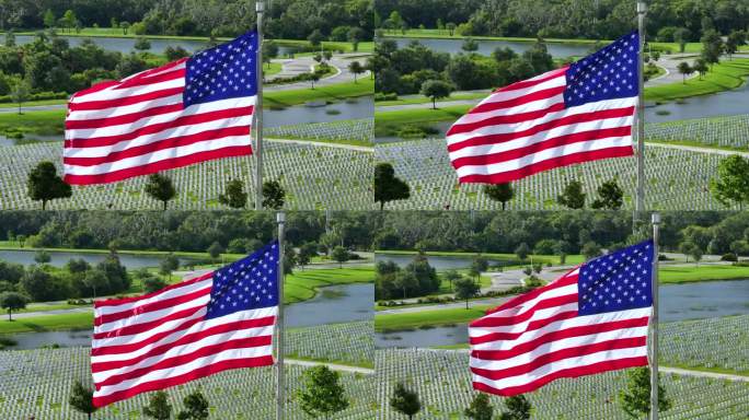 萨拉索塔国家公墓，美国国旗在绿色草坪上的许多白色墓碑上飘扬。阵亡将士纪念日概念