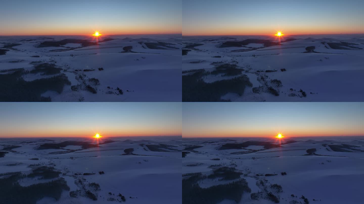 航拍北方冬季雪野暮色夕阳
