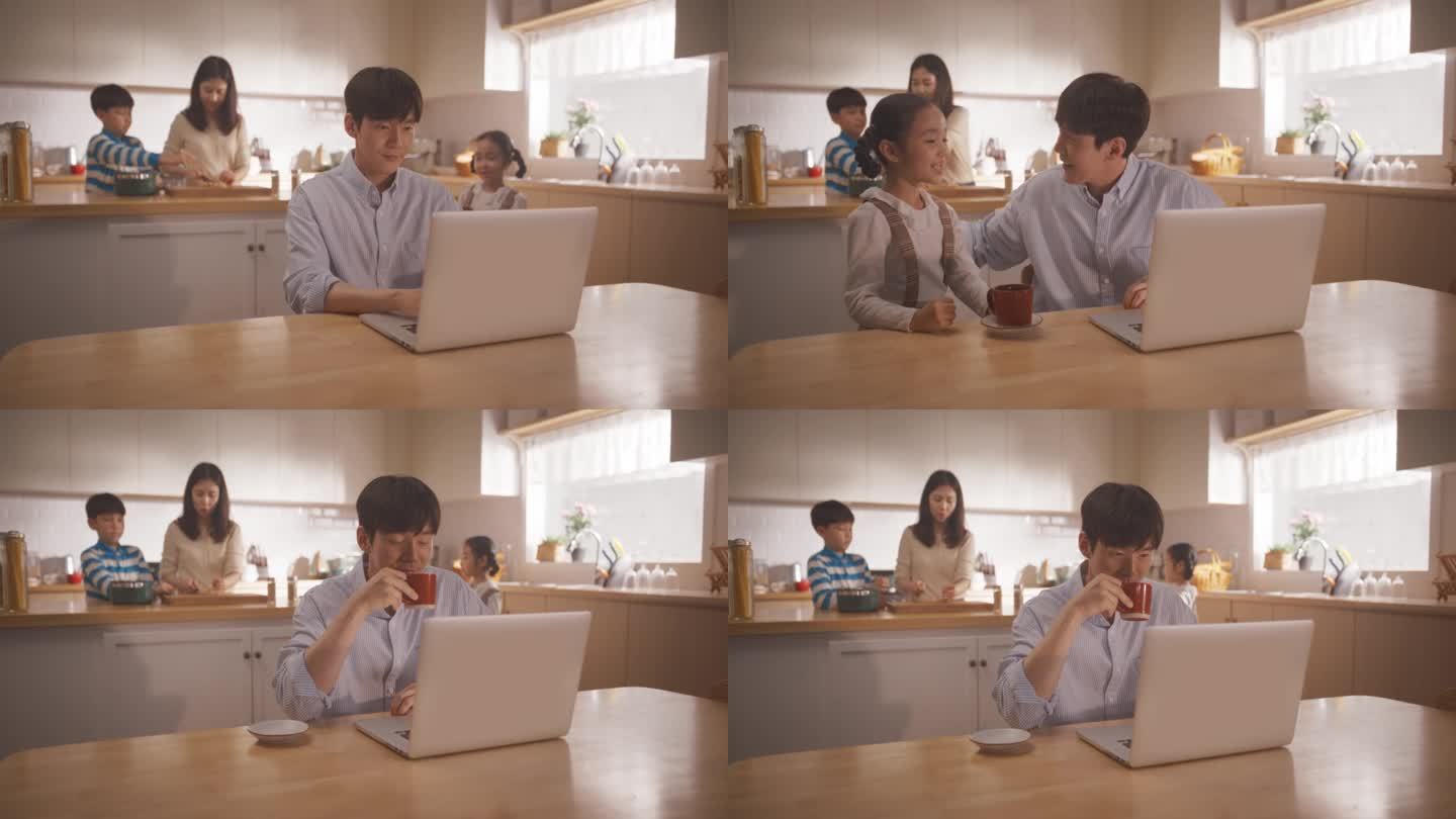 年轻的韩国父亲使用笔记本电脑在家工作，而他的妻子和孩子正在一起准备午餐。忙碌的商人在家办公和联系同事