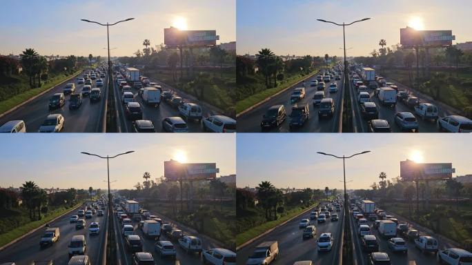 摩洛哥，卡萨布兰卡——2023年10月20日:日落时高速公路和交通的高角度视图
