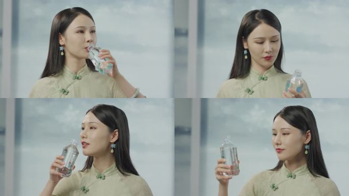 中式服装美女喝水