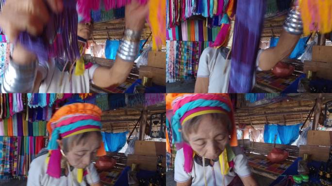 泰国北部乃梭村长脖子村民整理丝巾