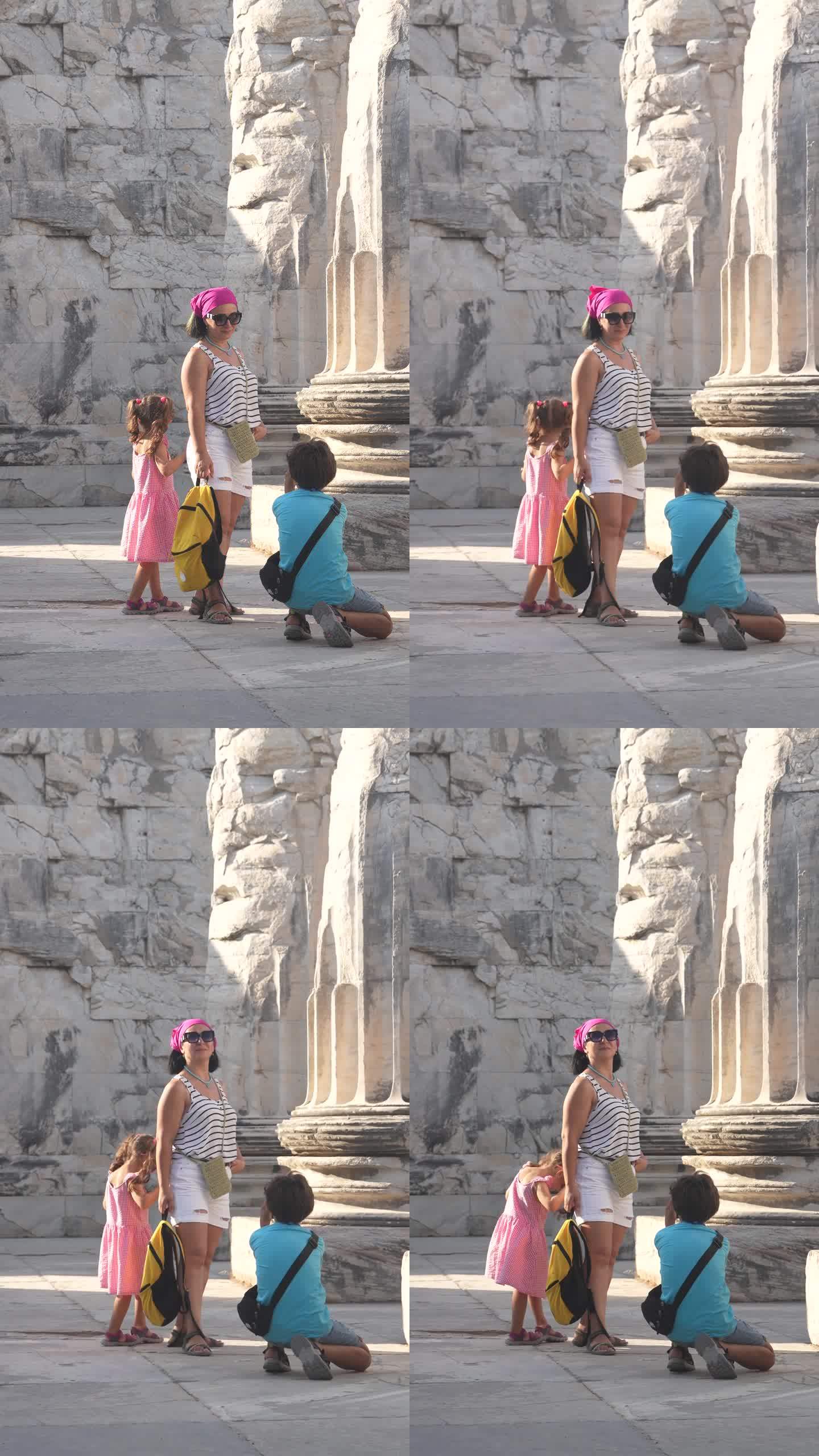 古希腊城市废墟中母亲、儿子和女儿的4k视频