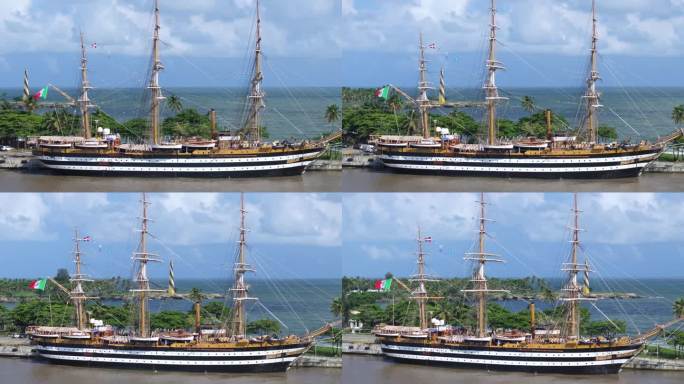 在多米尼加共和国的世界巡游中，意大利训练船Amerigo Vespucci在圣多明各港口的空中轨道拍