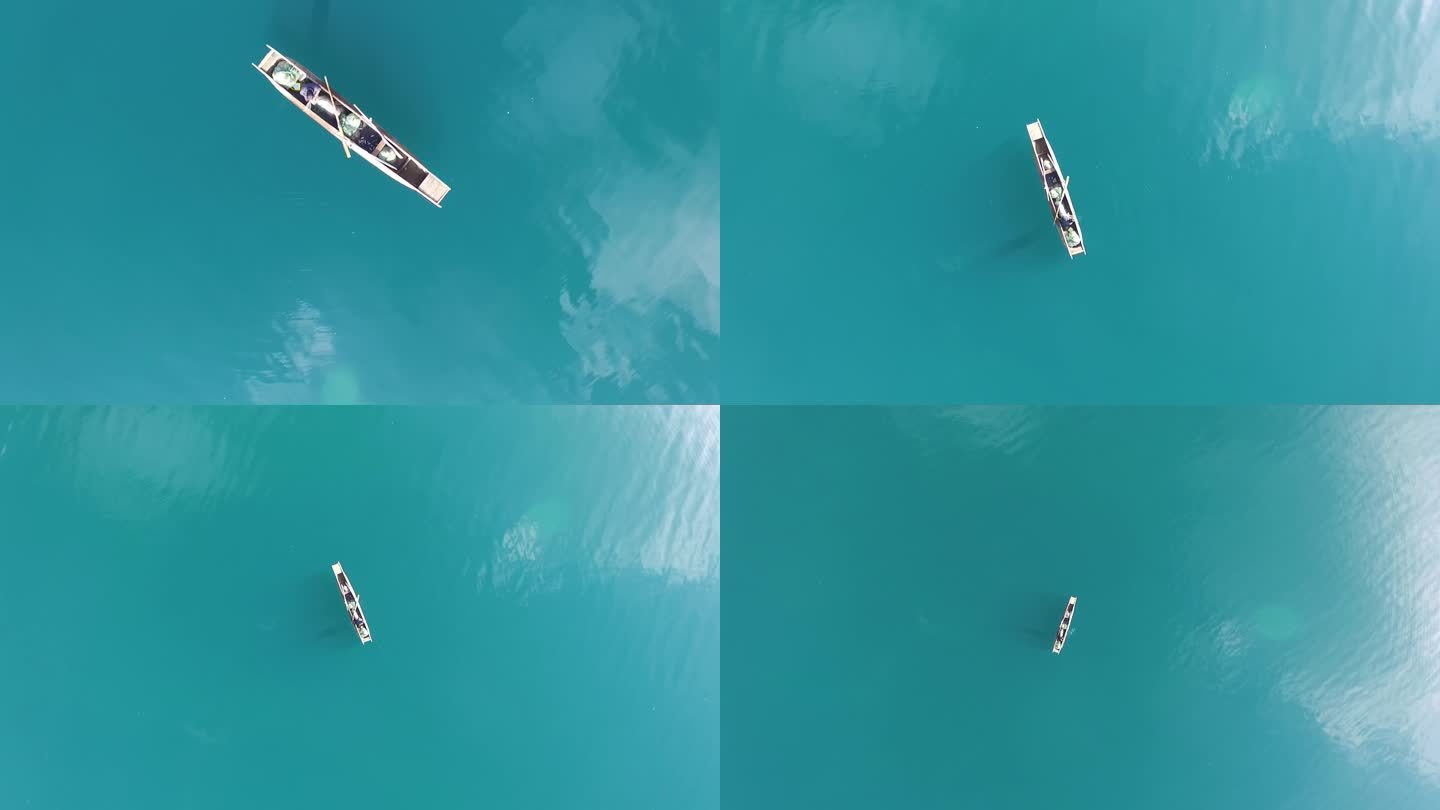 云南泸沽湖水上的船旋转航拍