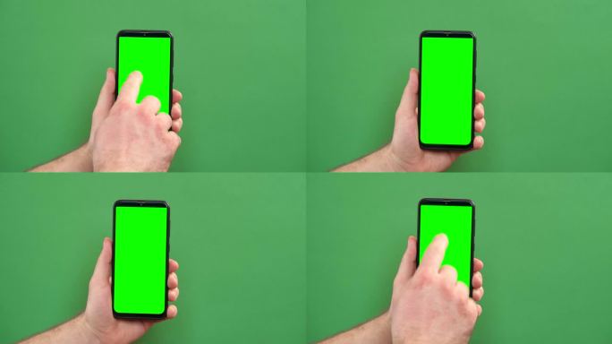 年轻人手持绿色背景的绿屏智能手机。手势。男性用手触摸，点击，敲击，滑动黑色手机的彩色显示屏。关闭设备