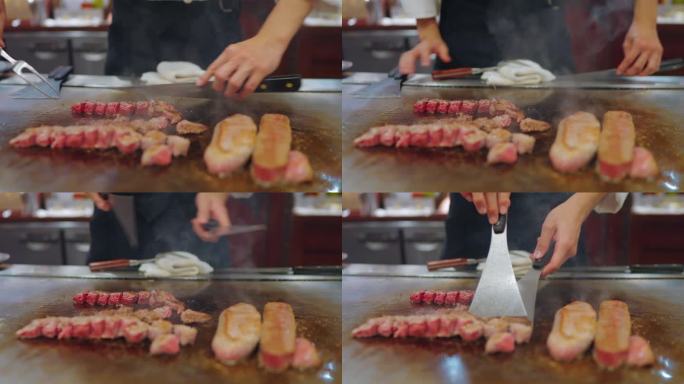 厨师在铁板烧上烹饪神户牛排