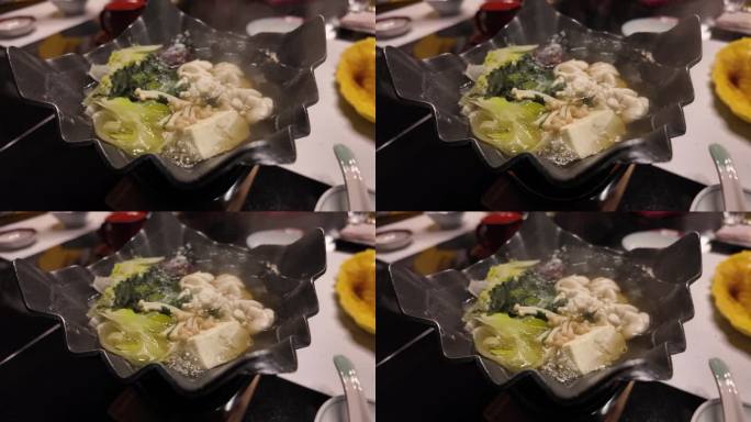 健康的日本食物在高档高档餐厅的餐桌上煮着——慢镜头