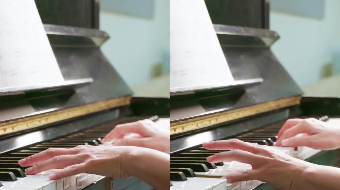 女人的手在弹钢琴特写空镜钢琴
