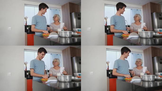 奶奶和孙子在厨房里聊天做饭