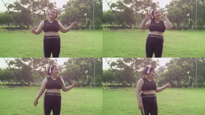 胖乎乎的女孩在公园里跳舞