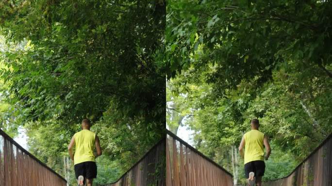 垂直画面:慢动作男子在桥上慢跑