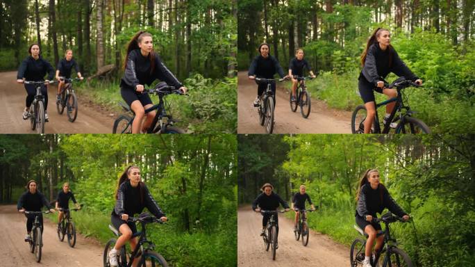 夏季，三名女运动员在森林里骑自行车，在大自然中做有氧运动