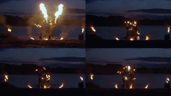 夏夜河畔的仪式与艺术之火表演，慢动作全镜头