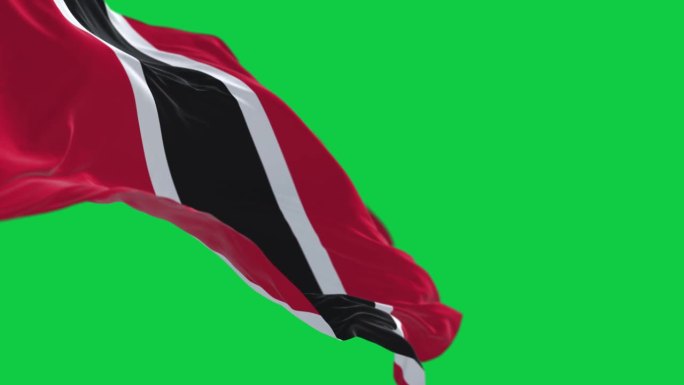 特立尼达和多巴哥国旗在绿色背景上孤立地飘扬