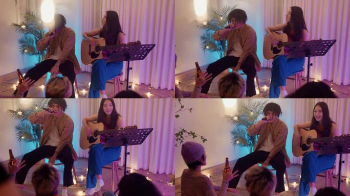 美丽的少女在弹吉他，年轻人在唱歌，他们在家里和朋友在一起。