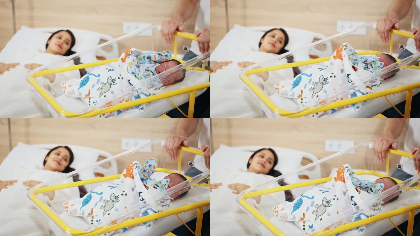 快乐的墨西哥妇女剖宫产后躺在产后医院的床上。她的丈夫用手抱着刚从婴儿床里出来的婴儿。医疗保健、生育和