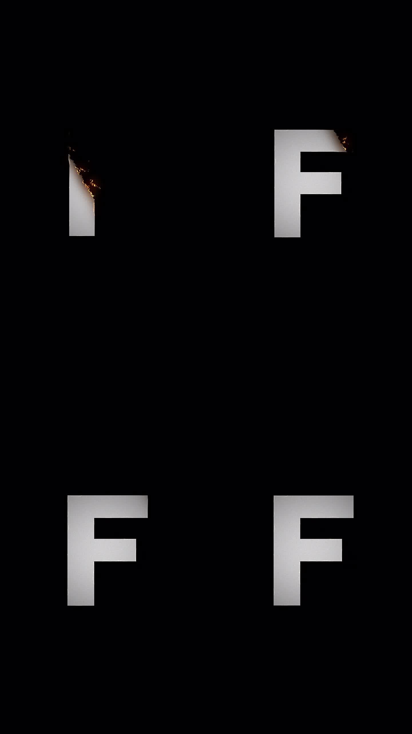 火字母显示和消失动画。F符号燃烧像纸烬和烟在黑色的背景。设计元素