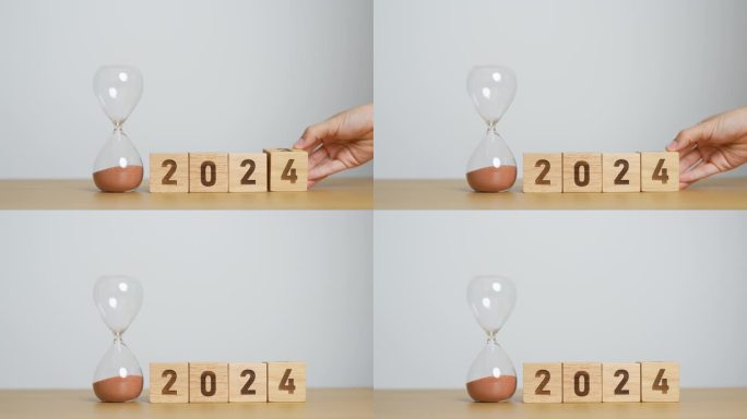 2024文本与沙漏在桌子上。决心，时间，计划，目标，动力，重启，倒计时和新年假期的概念