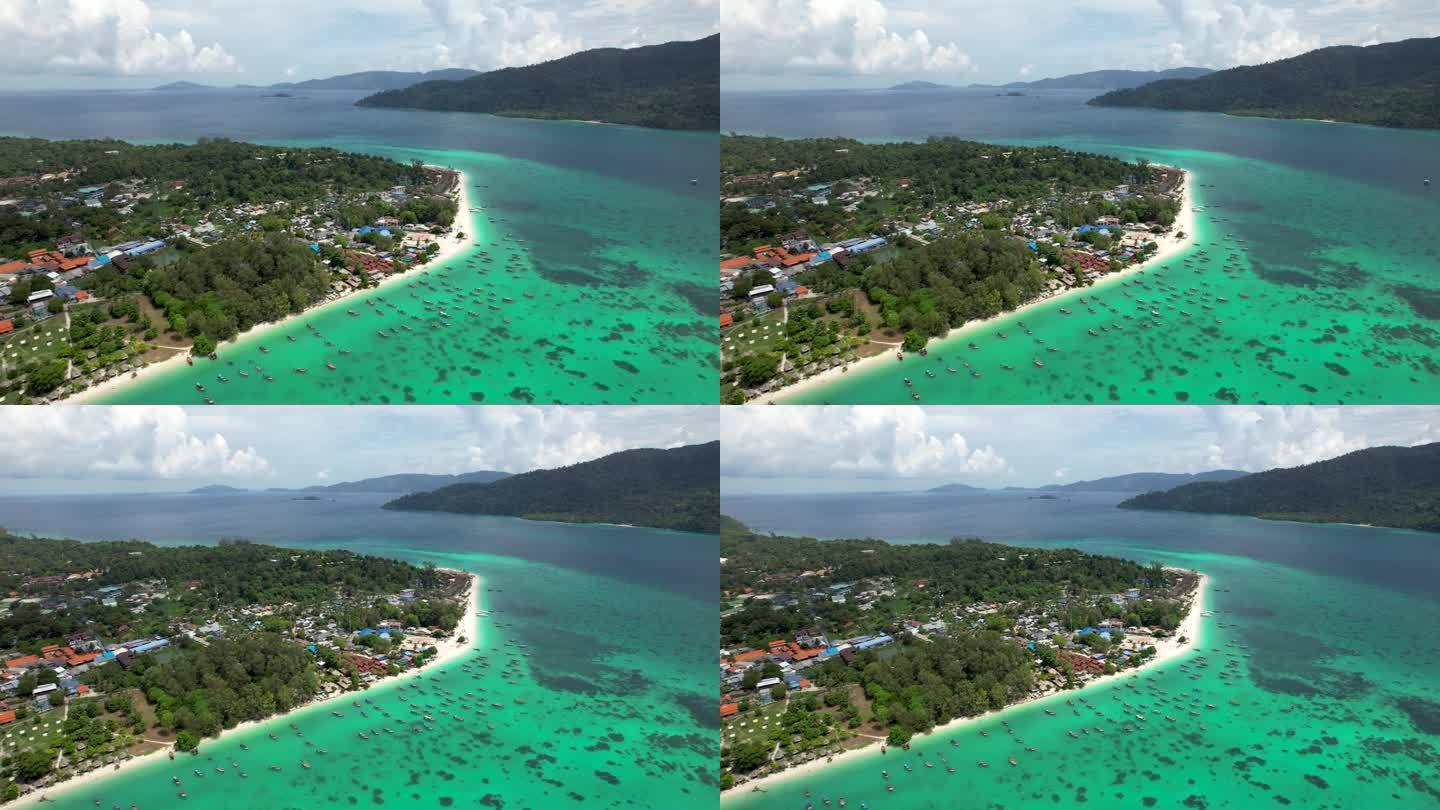 利佩岛泰国海岸线与绿松石水海滩和长尾船-空中透视