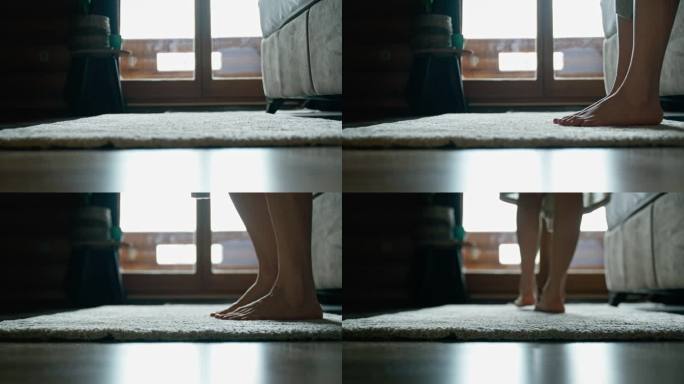 一个人的脚在地毯上行走的特写镜头