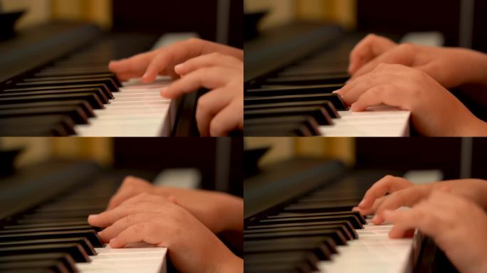 一个有抱负的音乐家的手指在黑白钢琴键上弹奏。