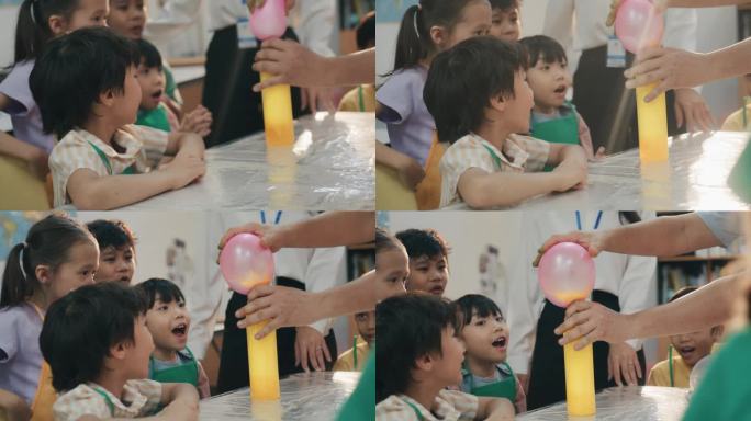 一群快乐的学生在科学课上快乐学习。试着把小苏打和气球一起做。