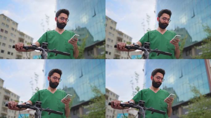 医护人员在骑自行车时使用手机