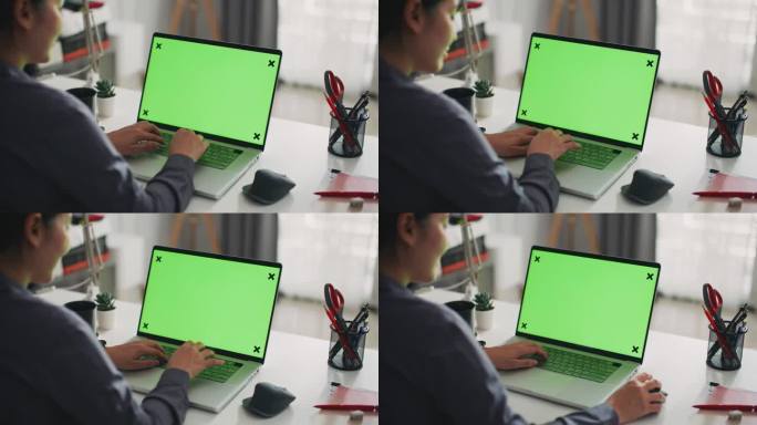 家里笔记本电脑绿屏的亚洲女人