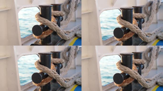 船艇和系泊船用带帆结的缆绳的近景。