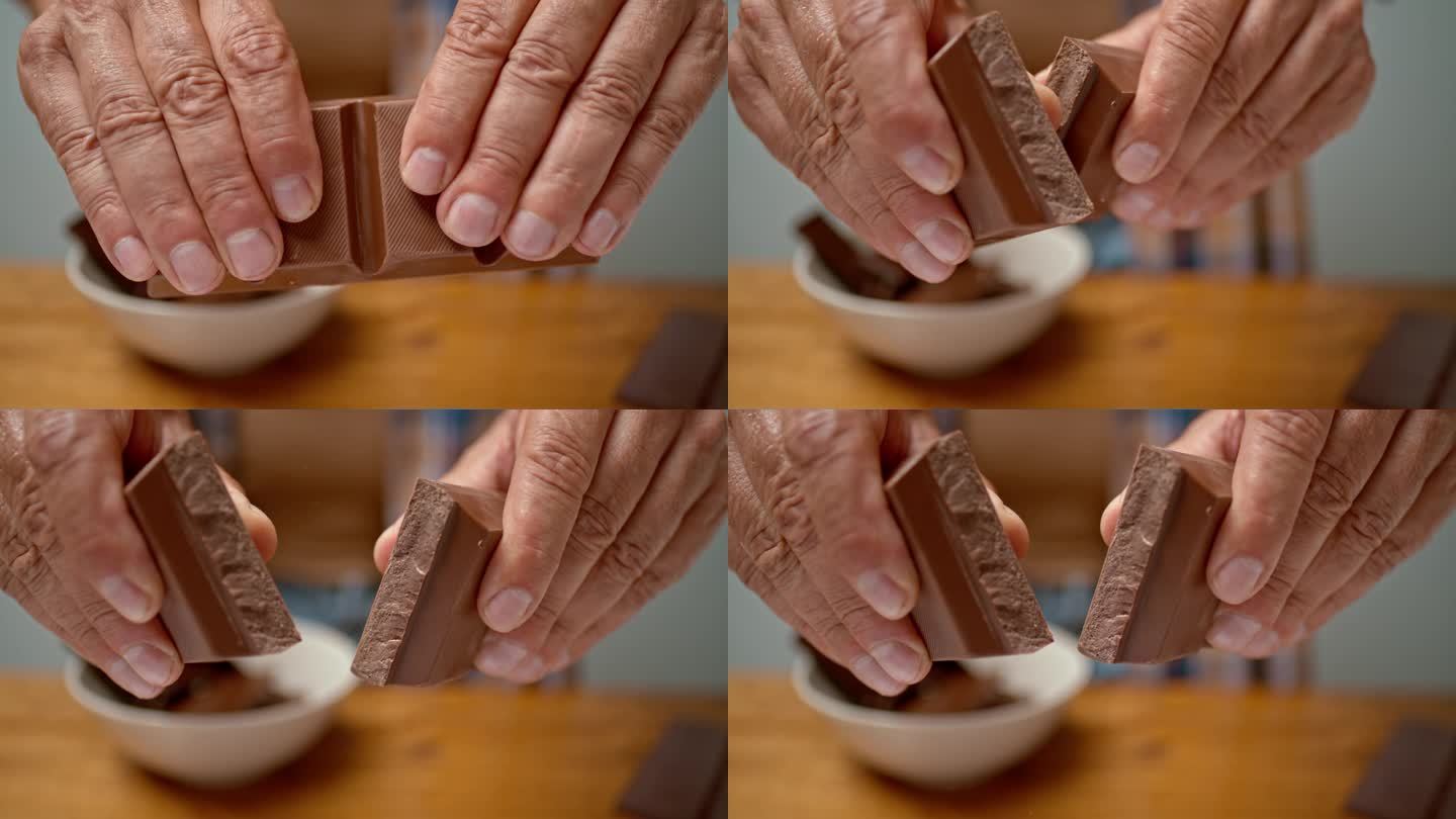 男人的手在掰巧克力