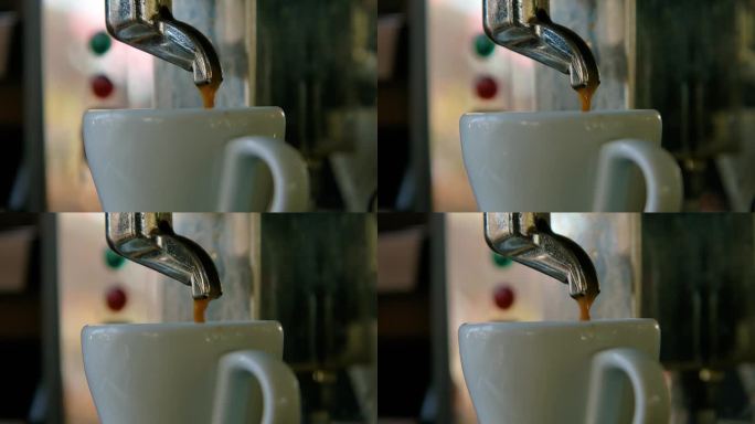 咖啡滴进白瓷茶杯，慢镜头特写