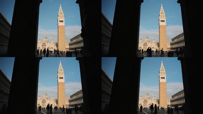 游客在威尼斯圣马可广场漫步，钟楼触摸蓝天