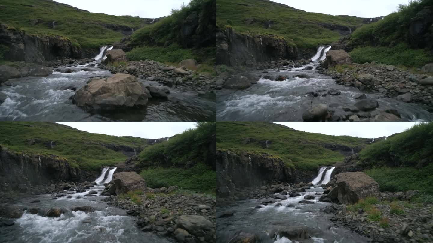 这是冰岛西峡湾Mjóifjordur的一个瀑布