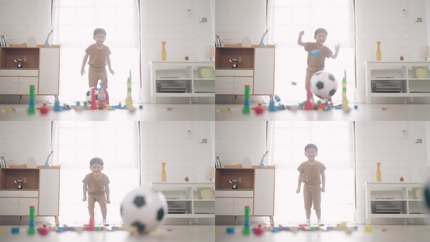 一个男孩把球踢进一只木制黄蜂后高兴地跳了起来，4K慢动作。