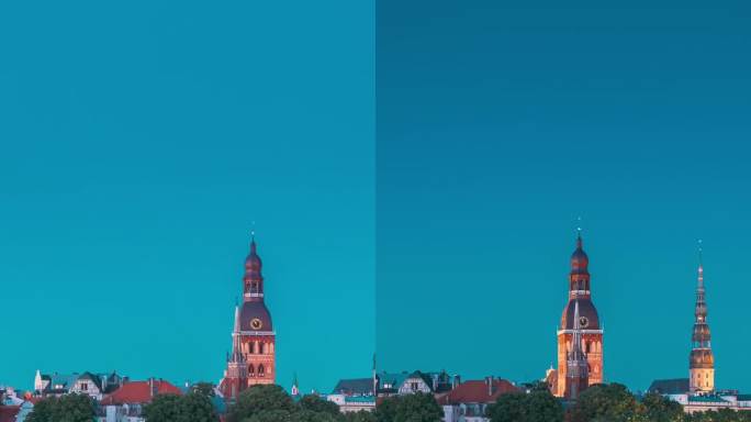 里加，拉脱维亚，欧洲。超延时城市夜景天际线。城堡、圆顶大教堂和圣彼得教堂夜景。联合国教科文组织世界遗