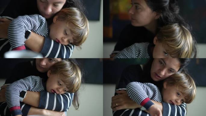 妈妈拥抱孩子的暖心场景，真正的母亲生活方式，妈妈抱着小男孩温暖照顾的瞬间