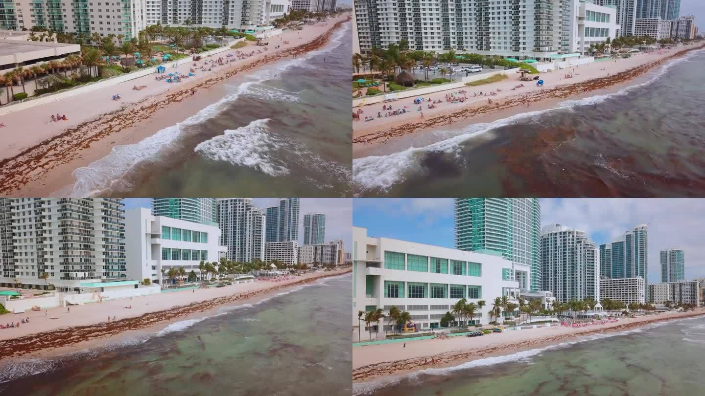 迈阿密海岸线的平移镜头。碧绿的海浪拍打着海滩