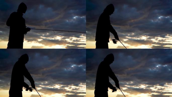 一位经验丰富的渔夫正试图用一根专业的纺线棒钓鱼。金色夕阳下的湖