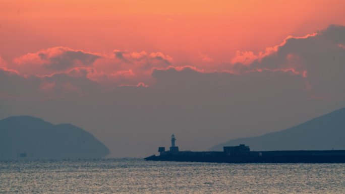 大连港灯塔大连湾海上日出延时摄影